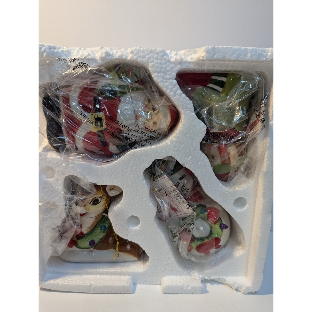 Mr. Christmas Light Up Ceramic Follow the Magic Ornaments Figures Set of 4‎
